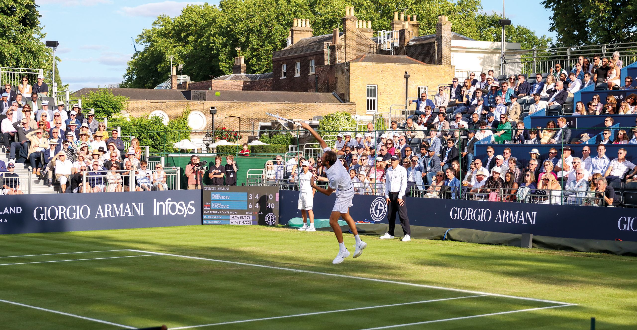 a couple of people are swimming in a cave